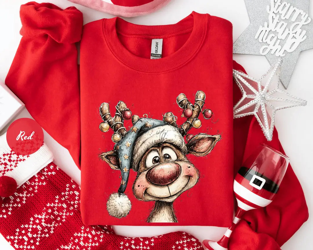 Red GD crewneck sweatshirt with a retro reindeer wearing a knit hat with ornament antlers, flat lay view.