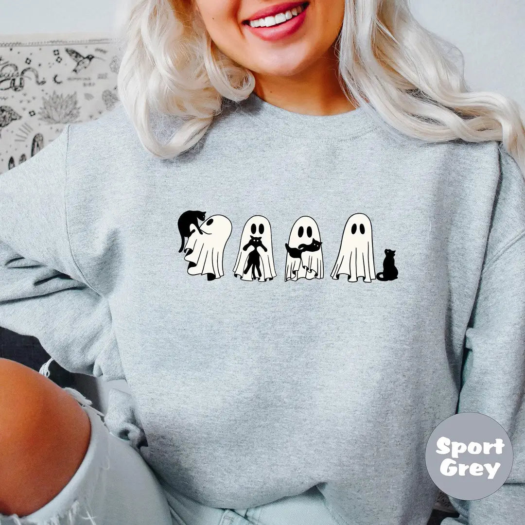 Sport Grey crewneck sweatshirt with four ghosts and a black cat in a row, worn by a model.