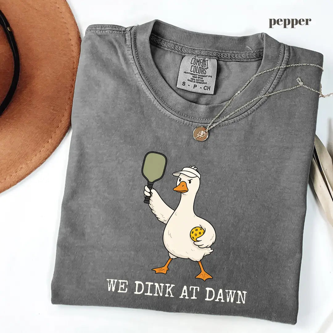 Pepper Comfort Colors 1717 T-shirt with We Dink At Dawn design worn by a model
