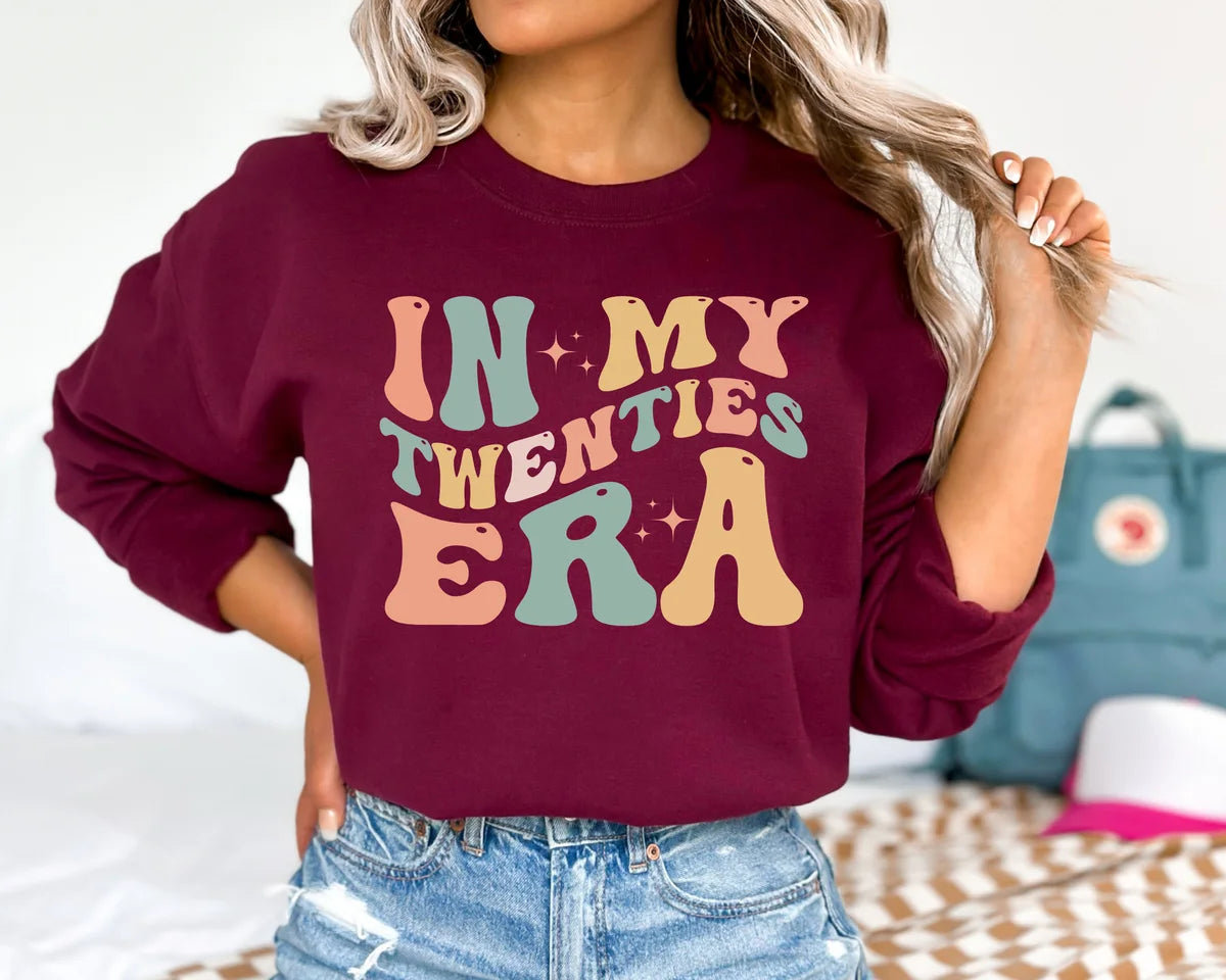 Maroon Crewneck sweatshirt with In My Twenties Era design, alternate product view.