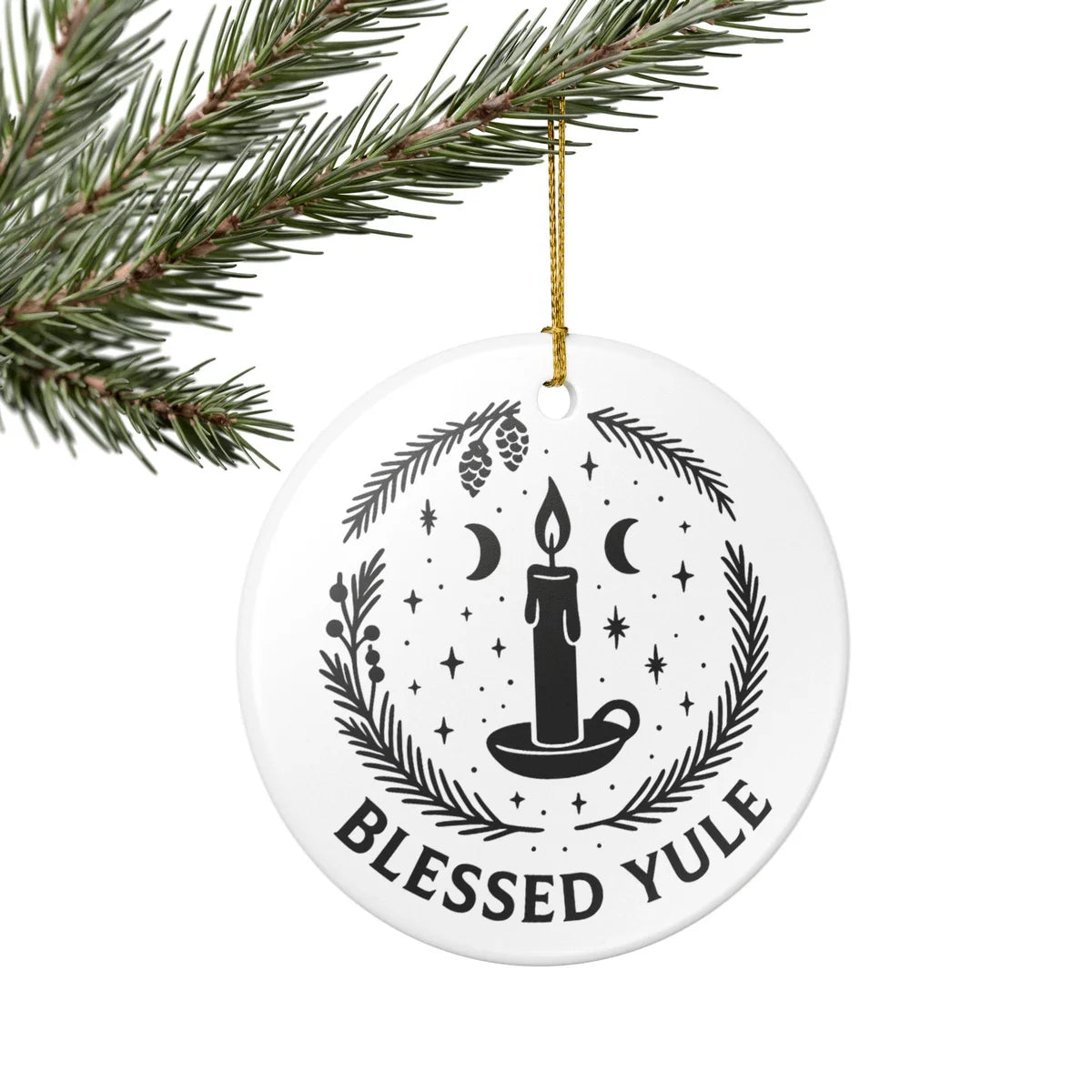 Alternate view of a round ceramic ornament with the visible Blessed Yule message.