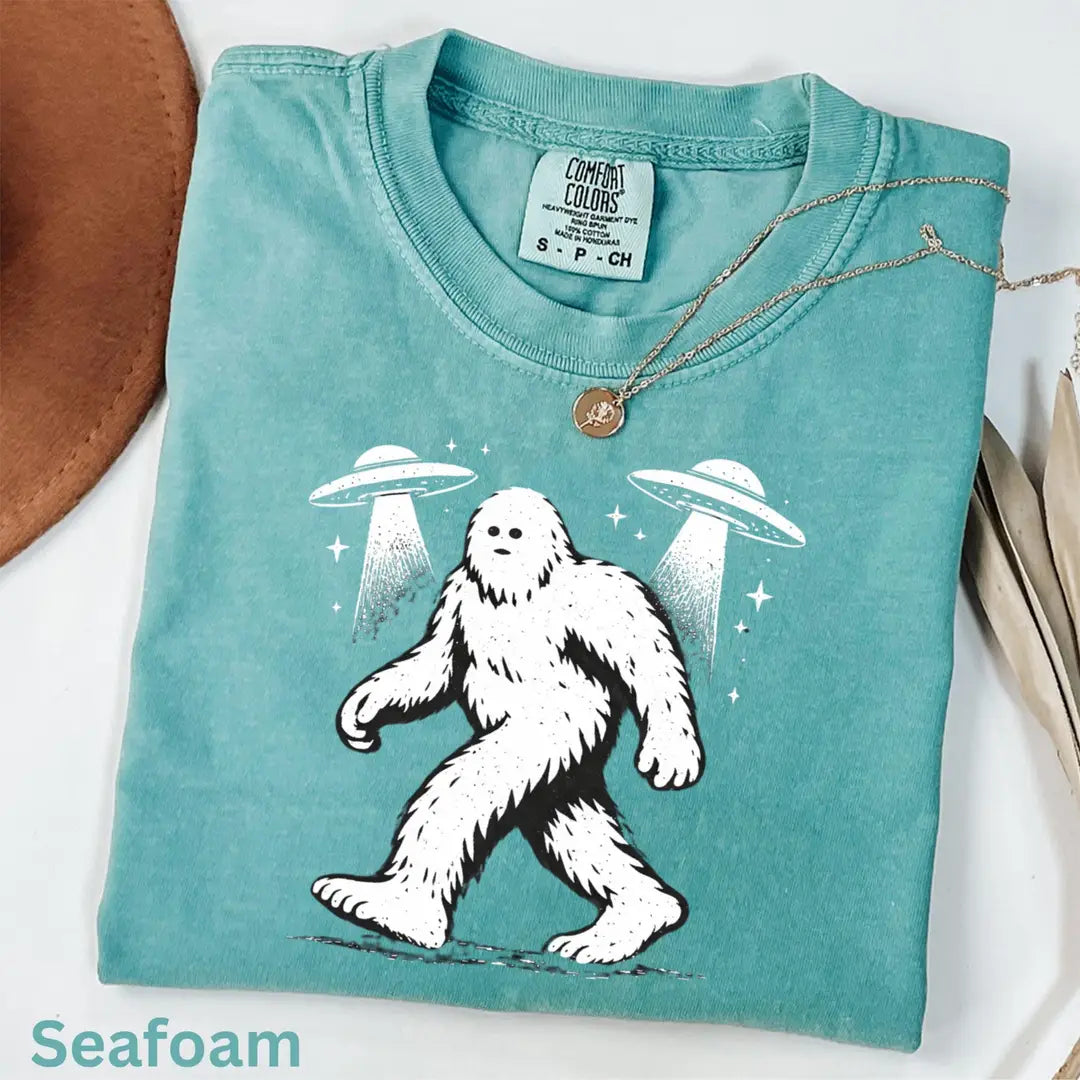 Blue Jean Crewneck sweatshirt with printed Bigfoot UFO design, alternate product view.