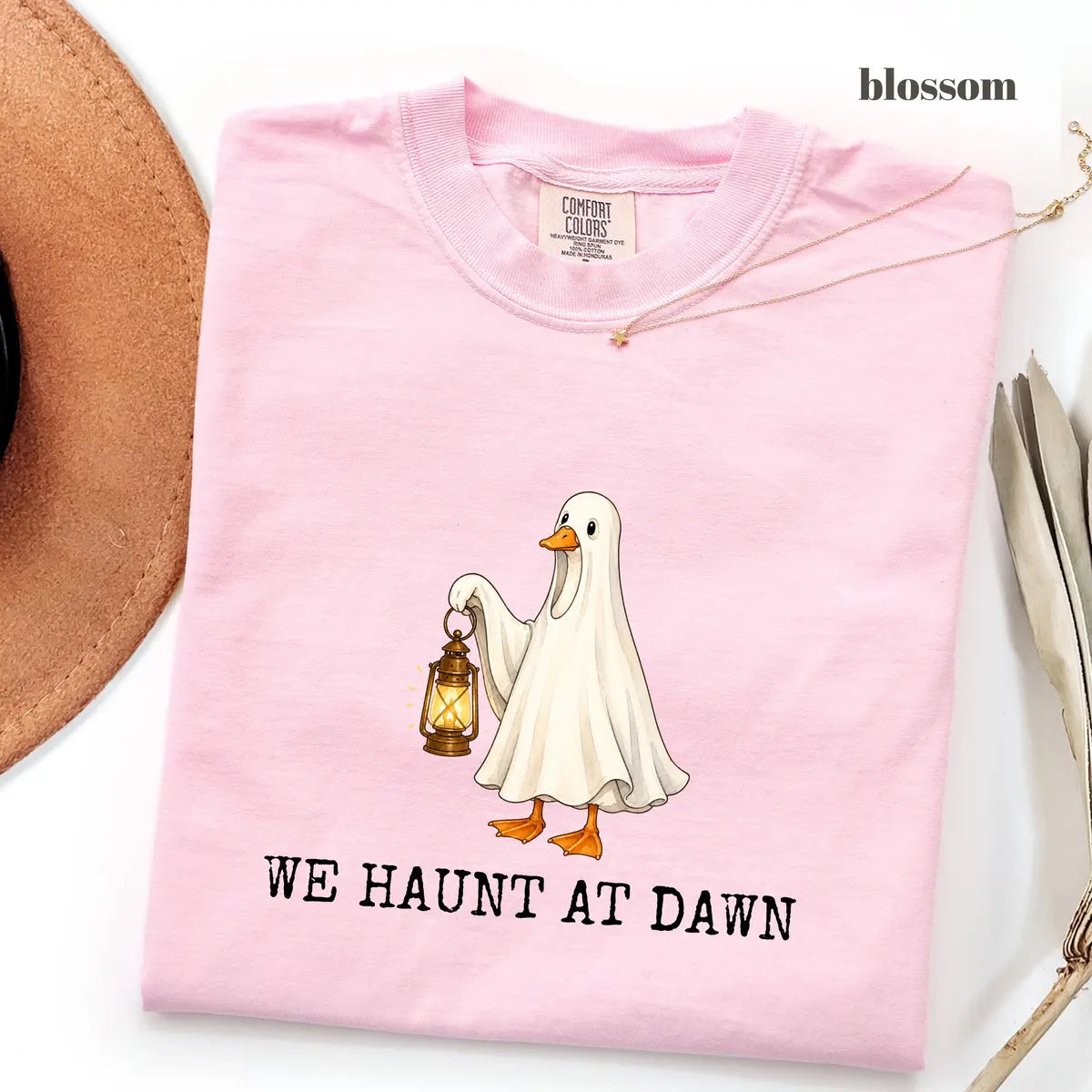 Blossom Comfort Colors 1717 T-shirt with We Haunt At Dawn Goose design worn by a model