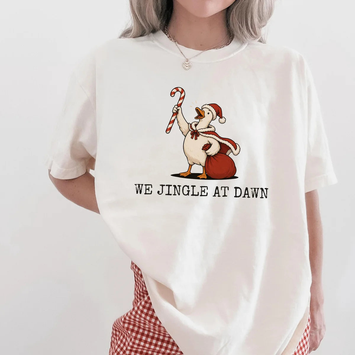 Comfort Colors 1717 T-shirt with We Jingle at Dawn Christmas design worn by a model view 2