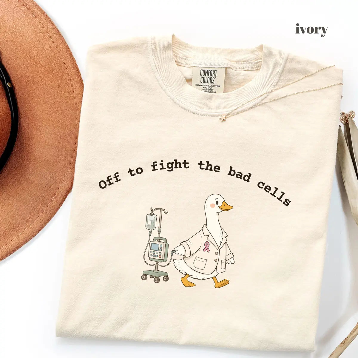Ivory Comfort Colors 1717 T-shirt with Off to Fight the Bad Cells design worn by a model