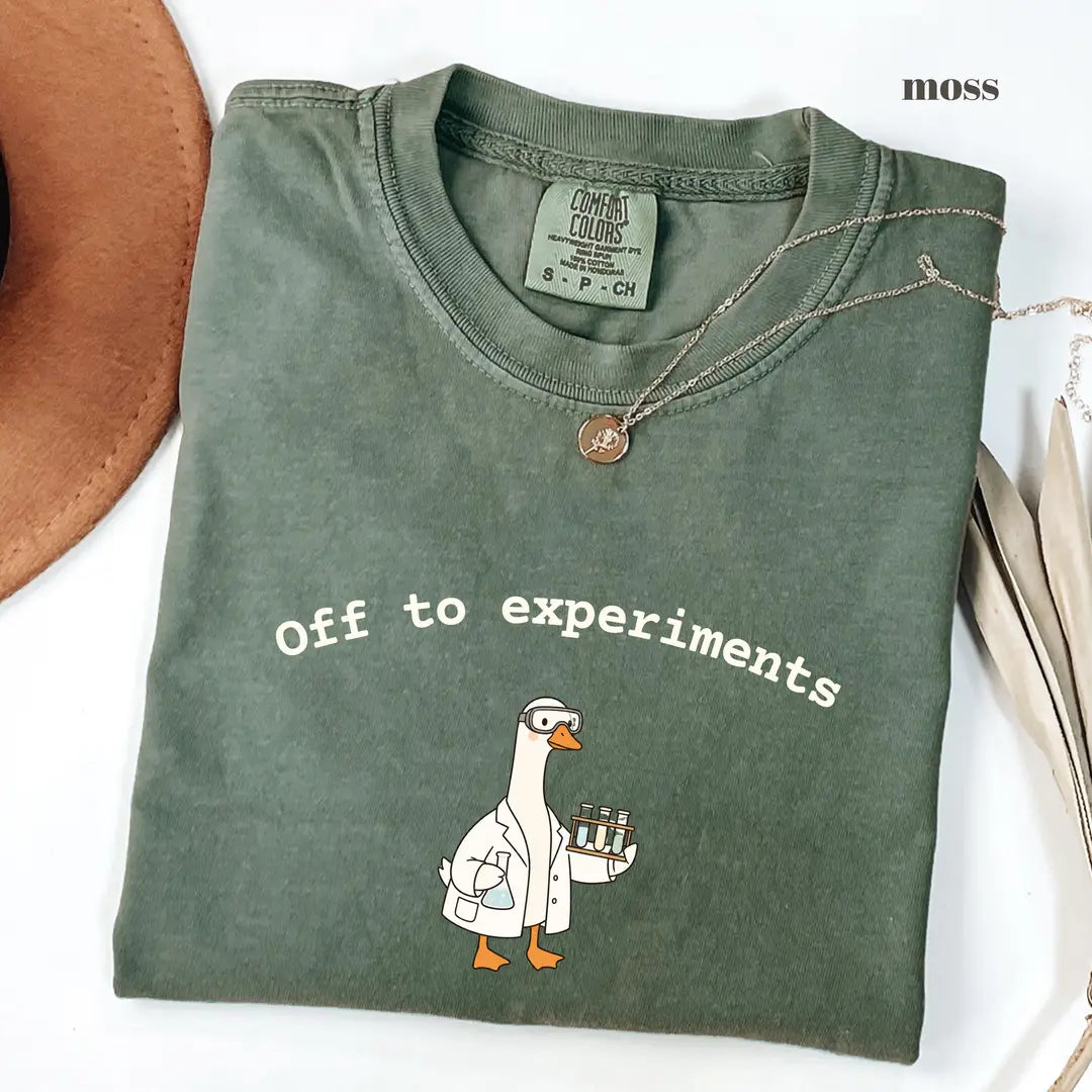 Moss Comfort Colors 1717 T-shirt with Off To Experiments design worn by a model view 2
