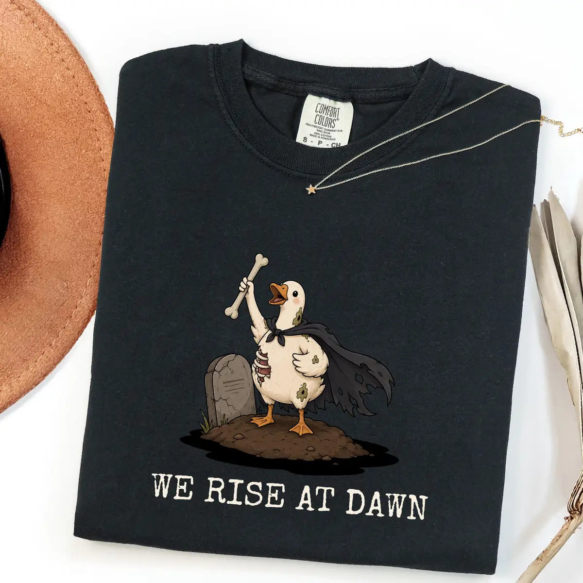 Black CF Comfort Colors 1717 T-shirt with We Rise at Dawn Halloween design worn by a model