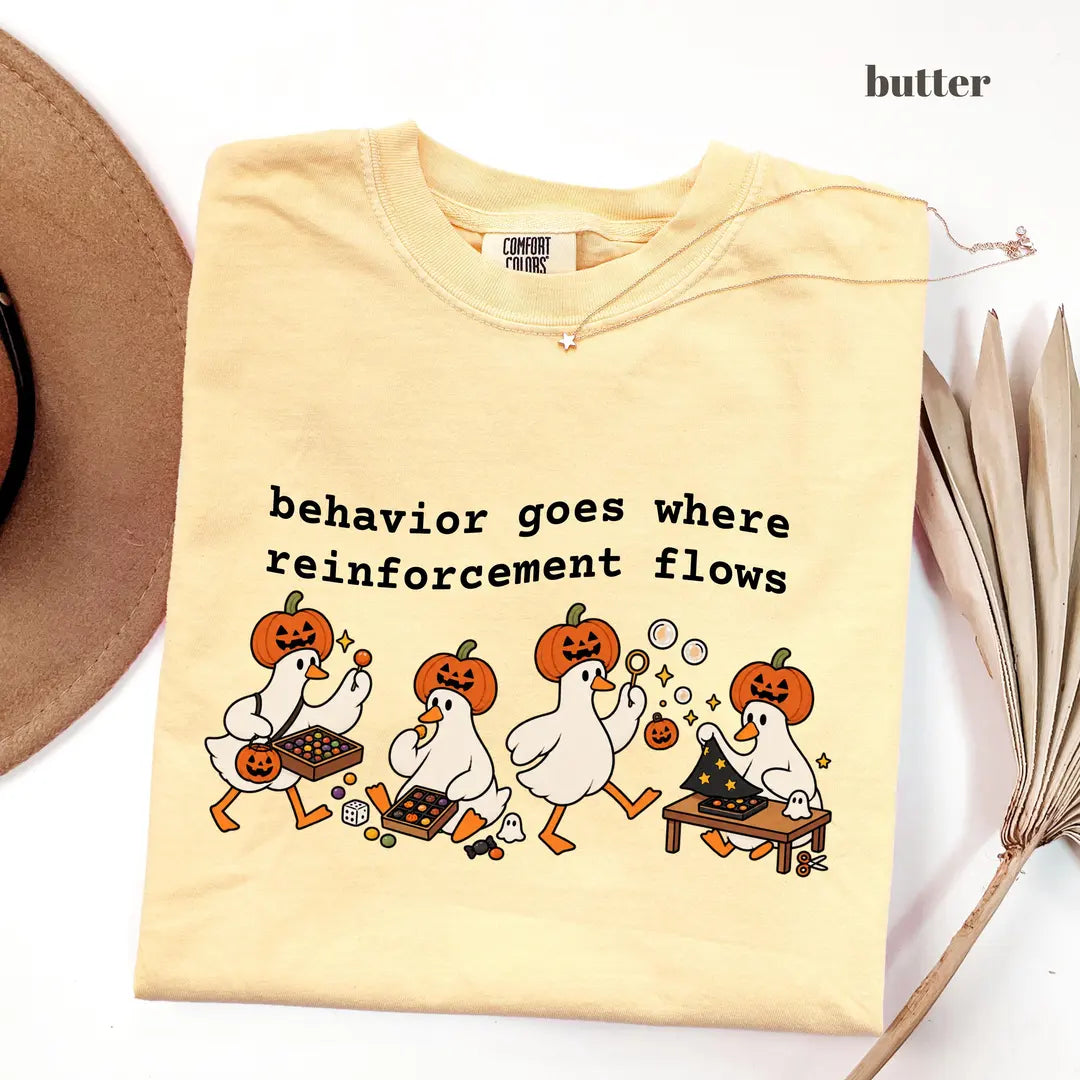 Butter Comfort Colors 1717 T-shirt with Behavior Goes Where Reinforcement Flows design worn by a model
