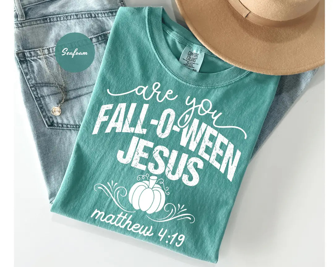Seafoam shirt with white a pumpkin with the words are you fall-o-ween jesus and matthew 4:19.