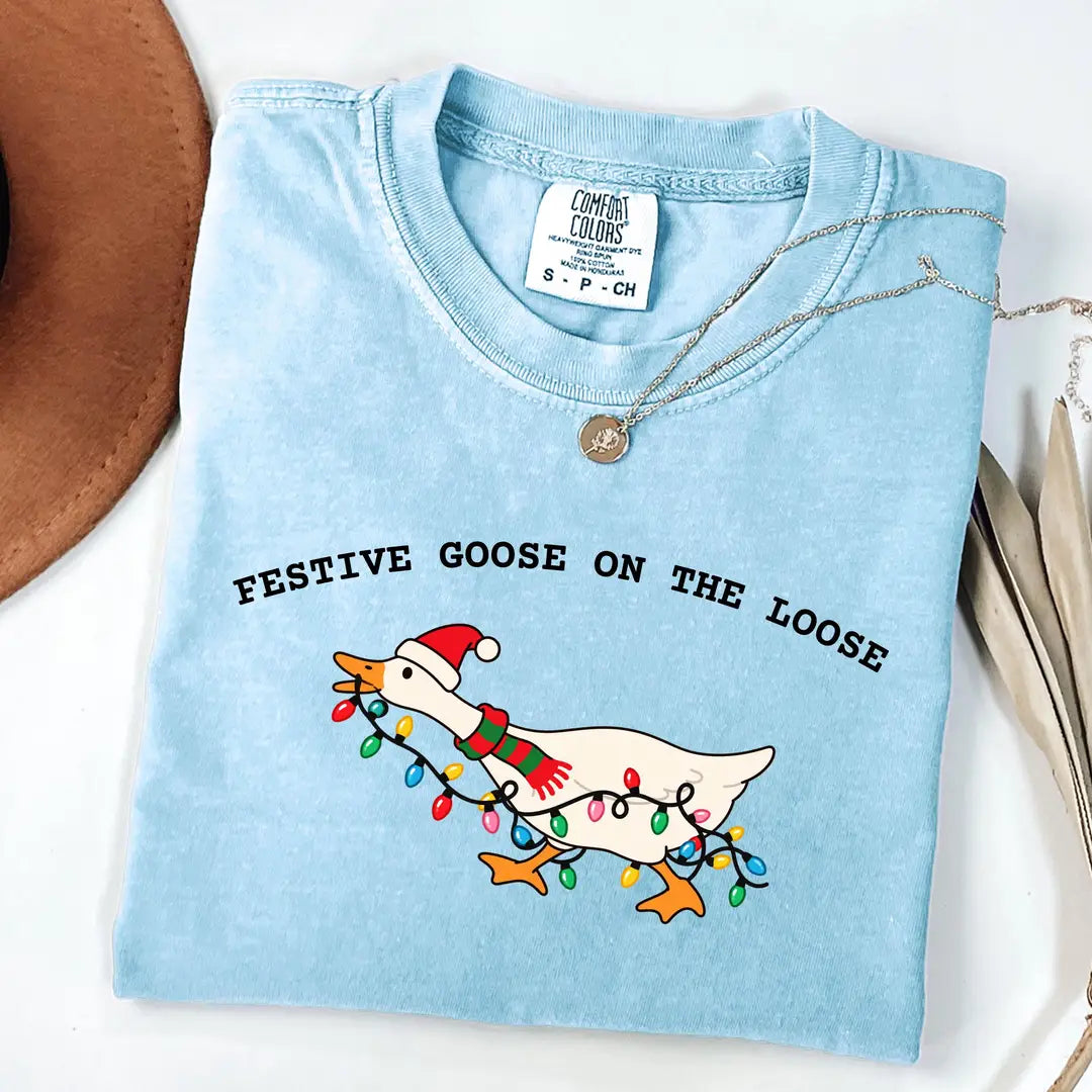 Comfort Colors 1717 T-shirt with Festive Goose on the Loose Christmas design worn by a model view 6
