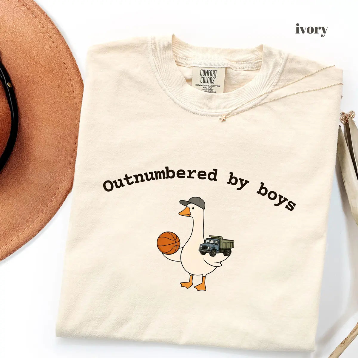 Ivory Comfort Colors 1717 T-shirt with Outnumbered By Boys design worn by a model