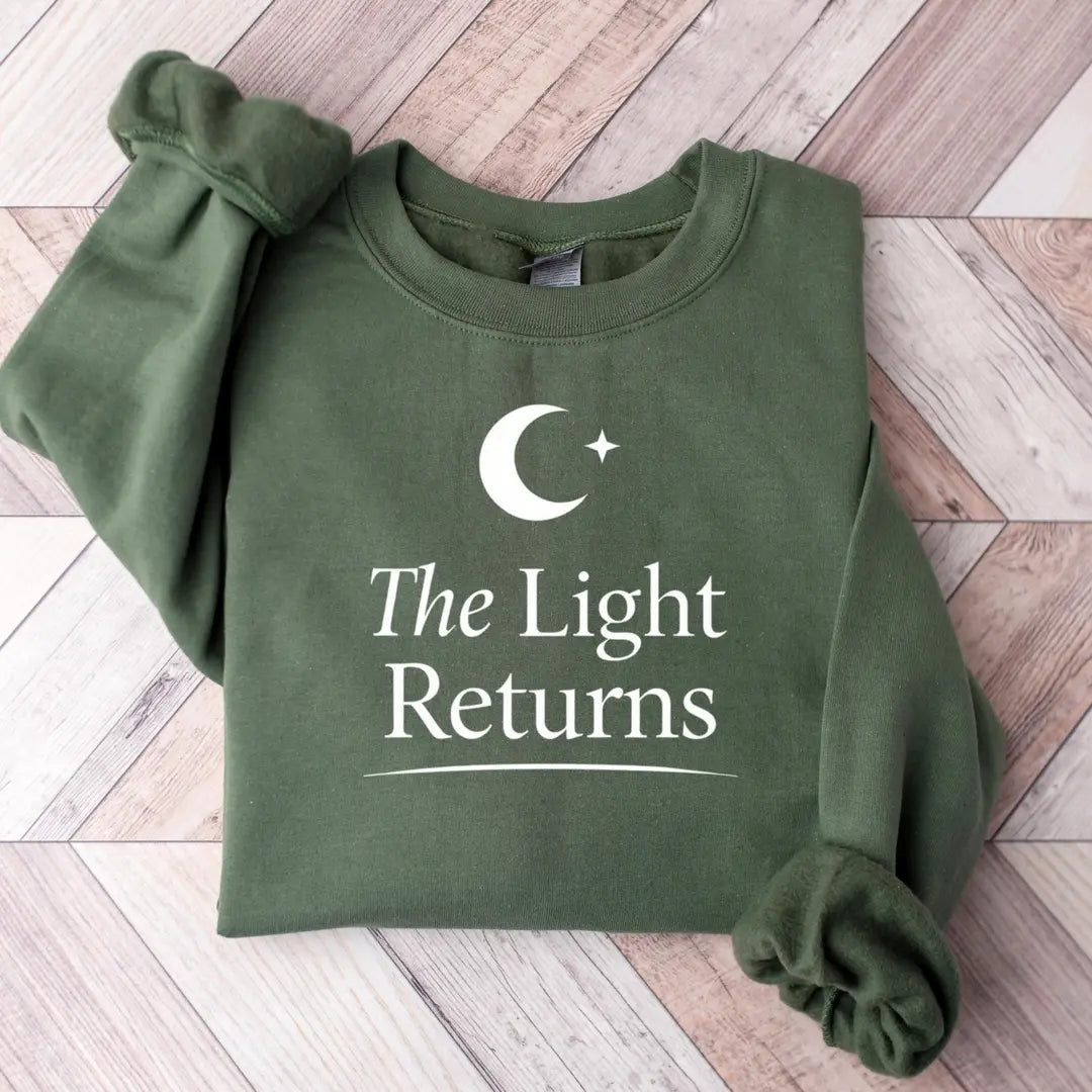 Crewneck sweatshirt with The Light Returns design, alternate product view.