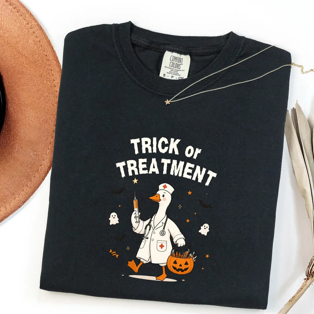 Black CF Comfort Colors 1717 T-shirt with Trick or Treatment Nurse Goose design