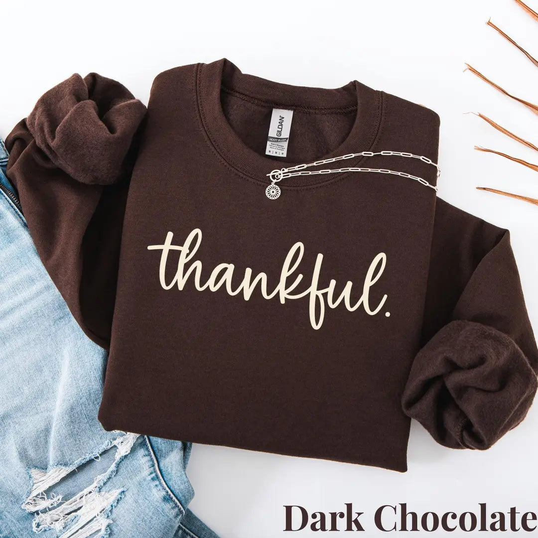 Crewneck sweatshirt with printed Thankful design, hero view.