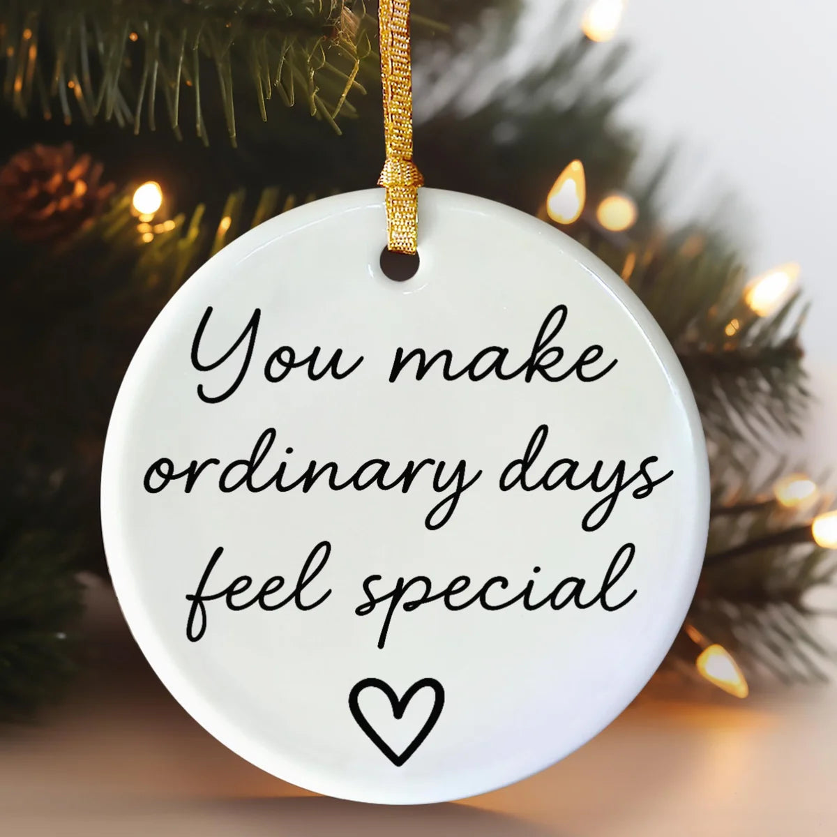 round ceramic ornament with the visible You Make Ordinary Days Feel Special message.