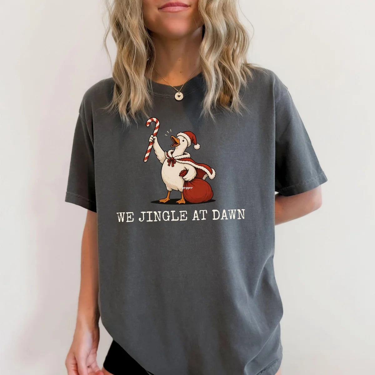 Comfort Colors 1717 T-shirt with We Jingle at Dawn Christmas design worn by a model