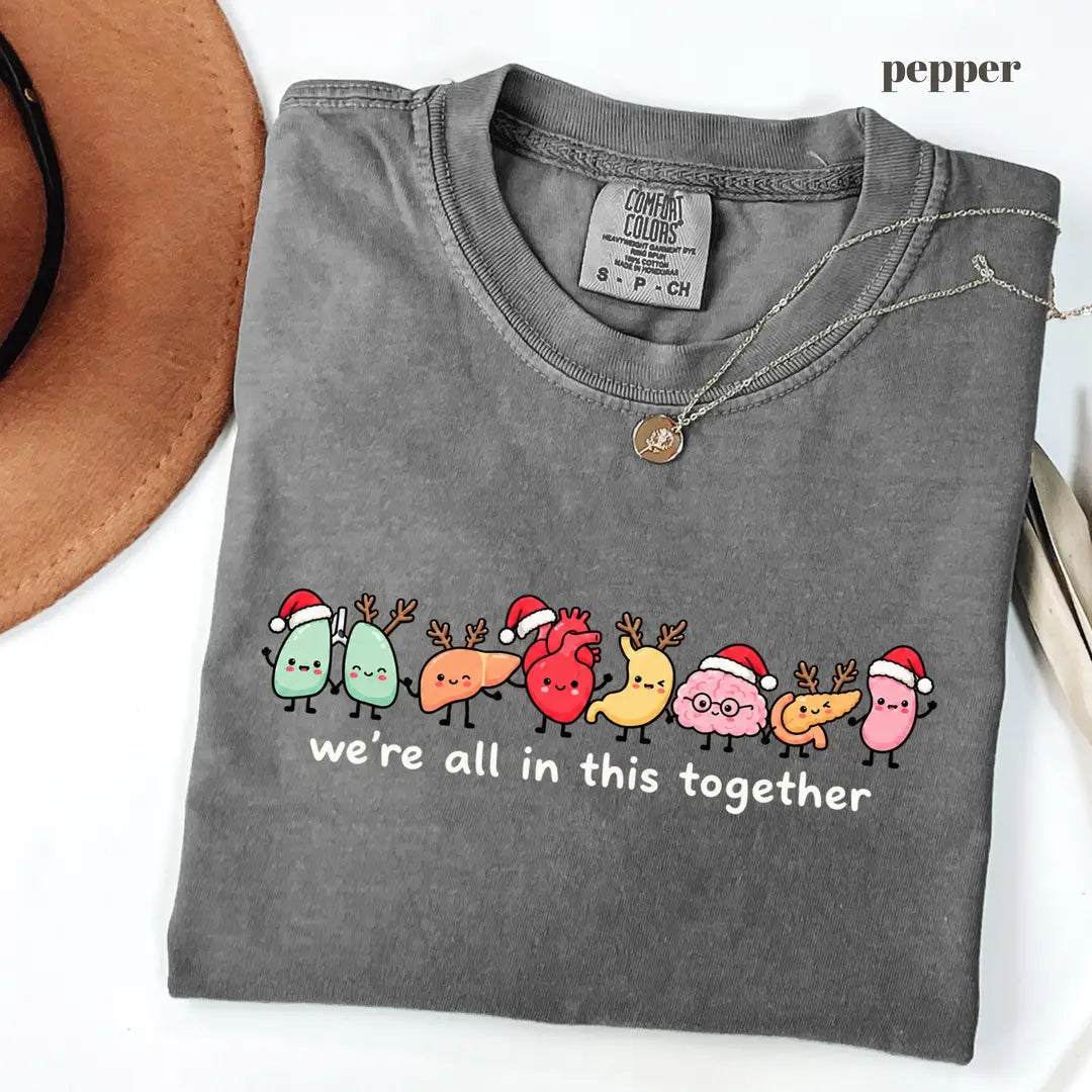 Pepper Comfort Colors 1717 T-shirt with Christmas Nurse design worn by a model