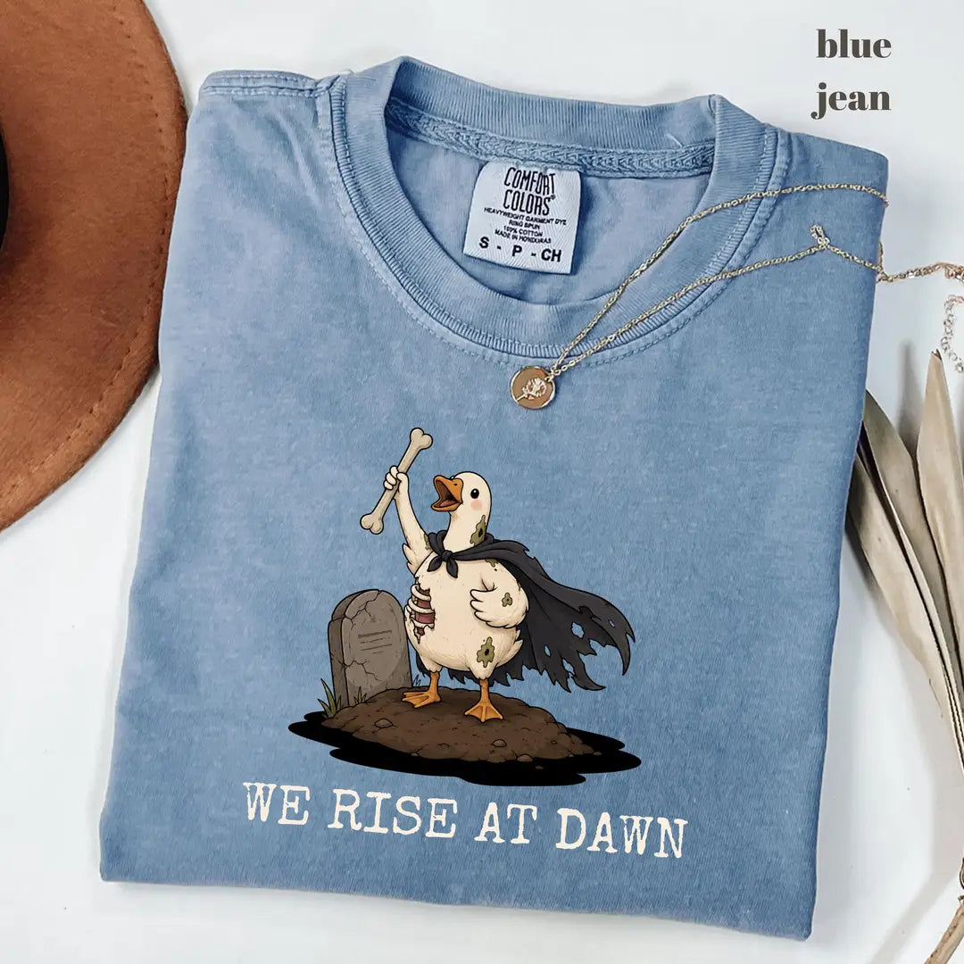 Blue Jean Comfort Colors 1717 T-shirt with We Rise at Dawn Halloween design worn by a model