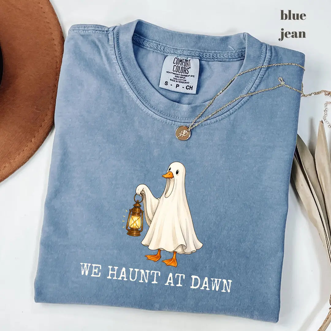 Blue Jean Comfort Colors 1717 T-shirt with We Haunt At Dawn Goose design worn by a model