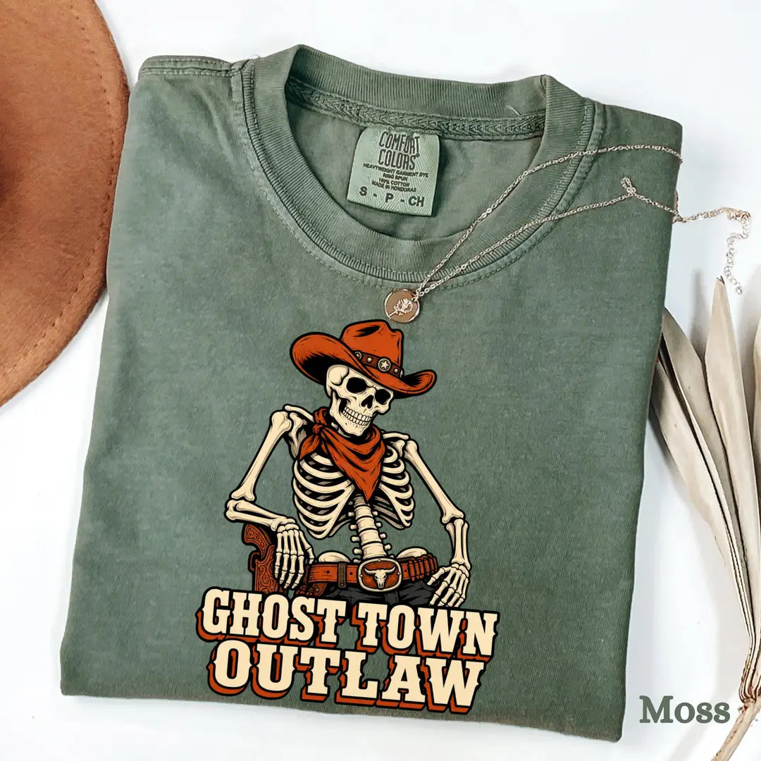 He's My Trick She's My Treat Skeleton Couple Comfort Colors T-Shirt shown on a model.