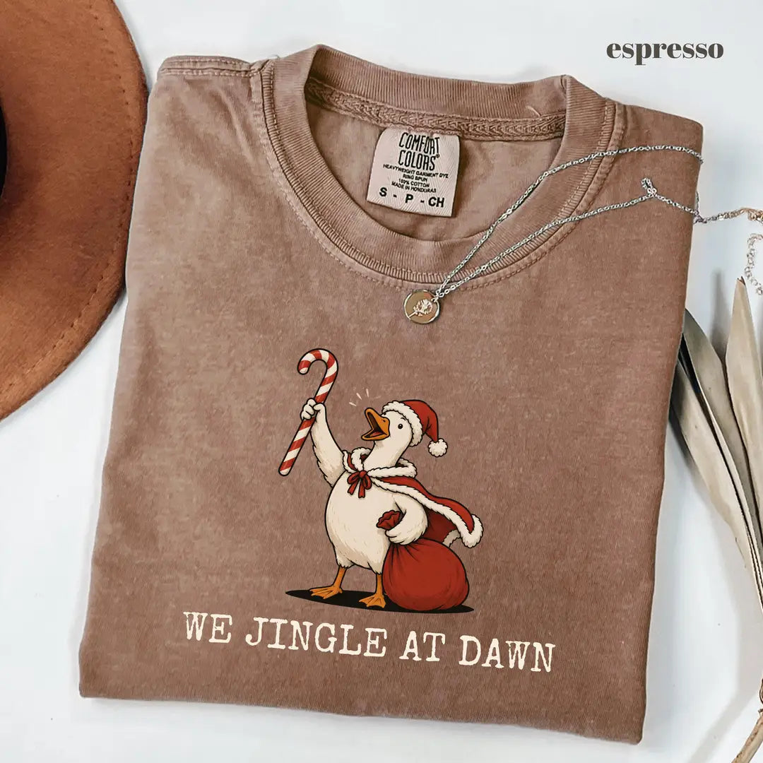 Espresso Comfort Colors 1717 T-shirt with We Jingle at Dawn Christmas design worn by a model