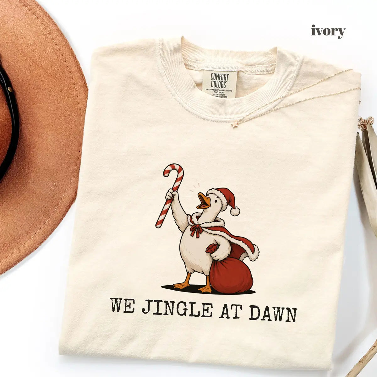 Ivory Comfort Colors 1717 T-shirt with We Jingle at Dawn Christmas design worn by a model