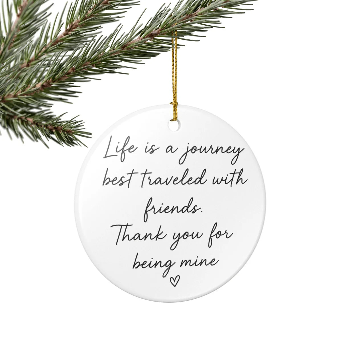 Alternate view of a round ceramic ornament with the visible Life Is a Journey Best Traveled With Friends message.