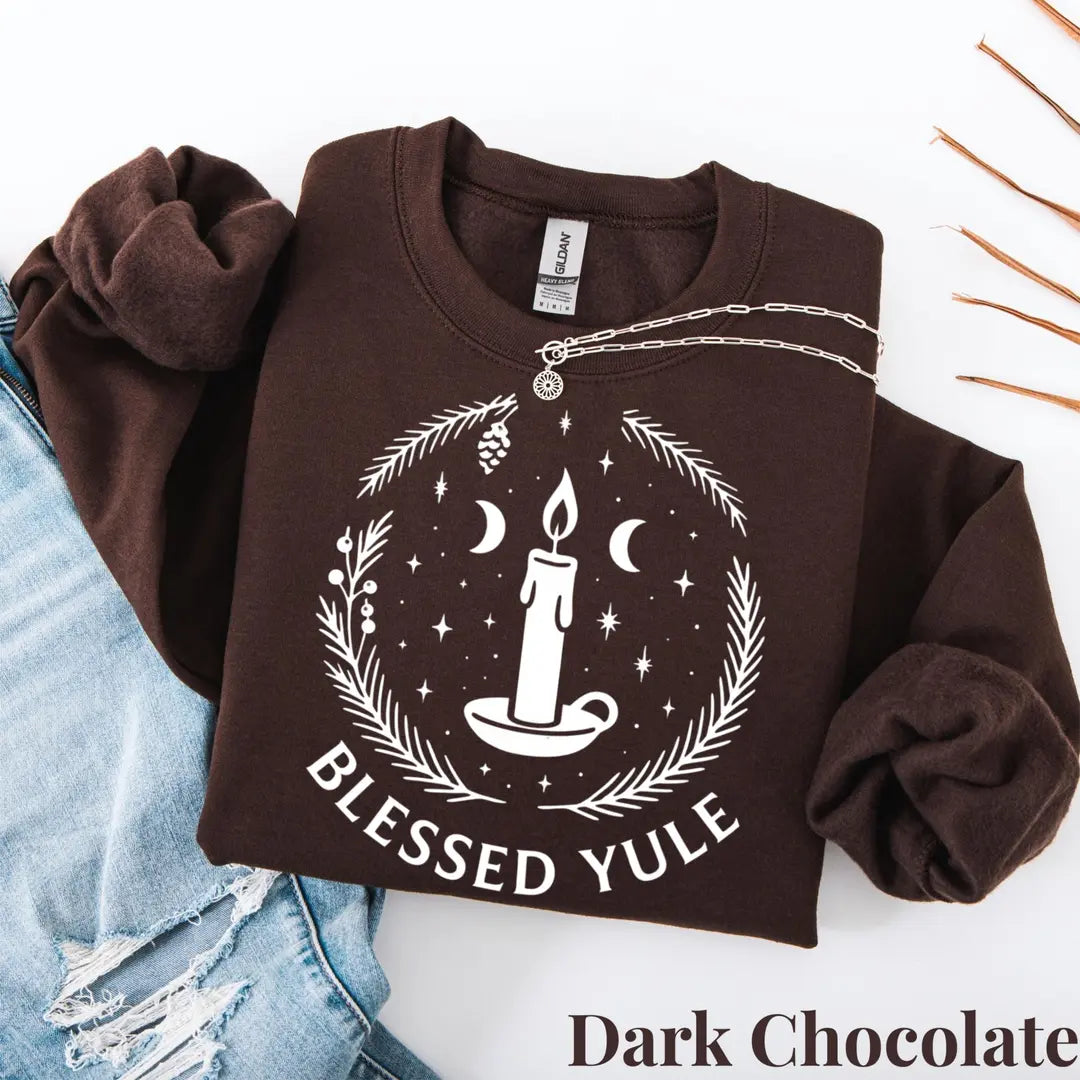 Crewneck sweatshirt with embroidered Blessed Yule Christmas design, alternate product view.