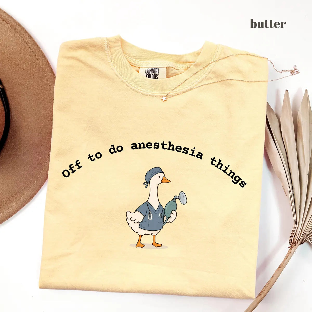 Butter Comfort Colors 1717 T-shirt with Off To Do Anesthesia Things Goose design worn by a model