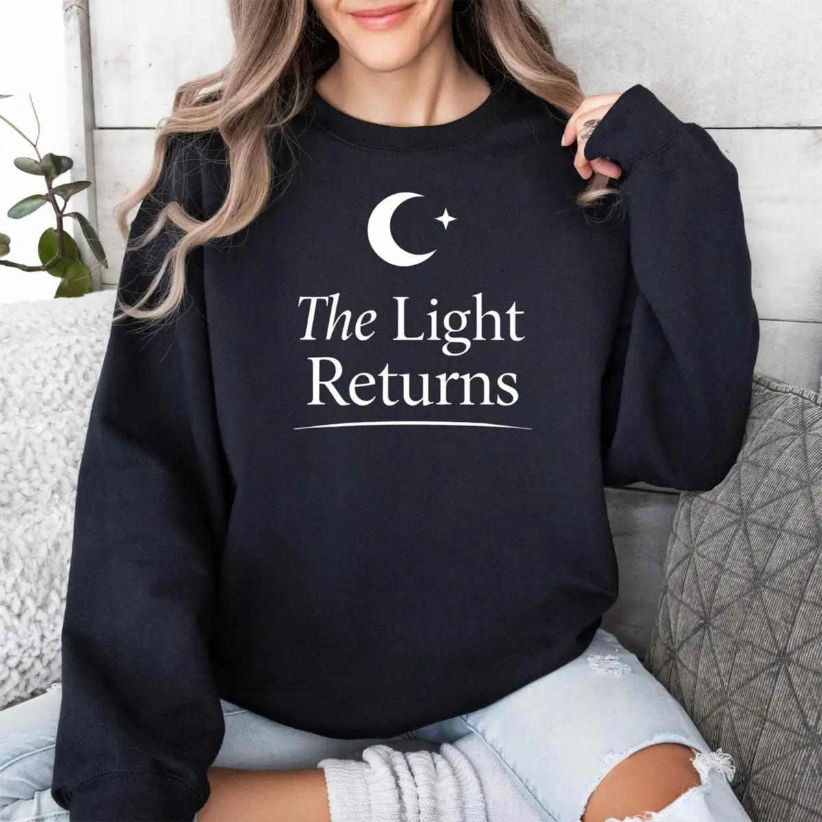 Crewneck sweatshirt with The Light Returns design, alternate product view.