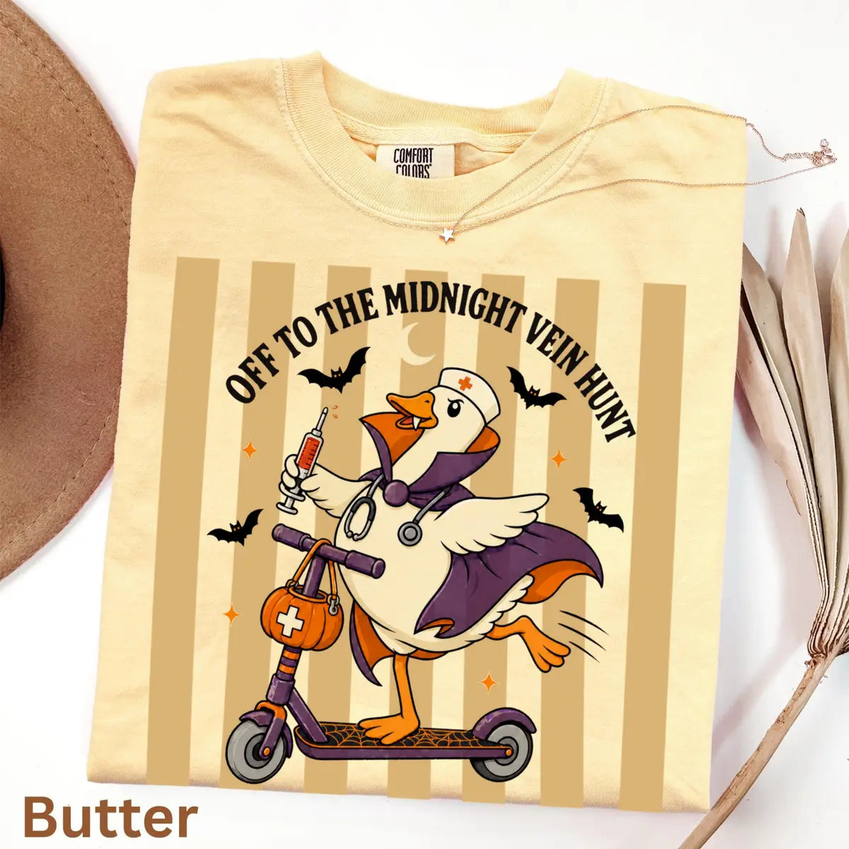 Off to the Midnight Vein Hunt - Nurse Goose Halloween Comfort Colors T-Shirt alternate product view in Butter.