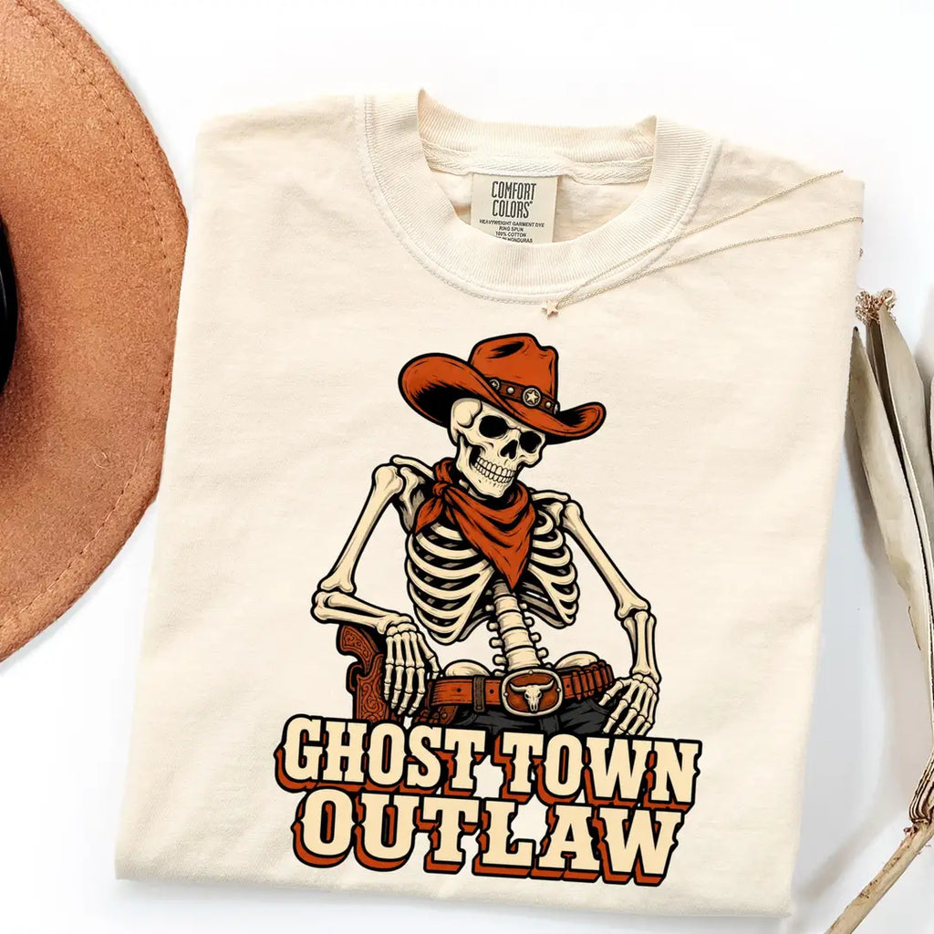 He's My Trick She's My Treat Skeleton Couple Comfort Colors T-Shirt shown on a model.