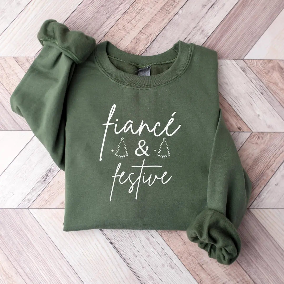 Crewneck sweatshirt with embroidered Fiancé Christmas design, hero view.