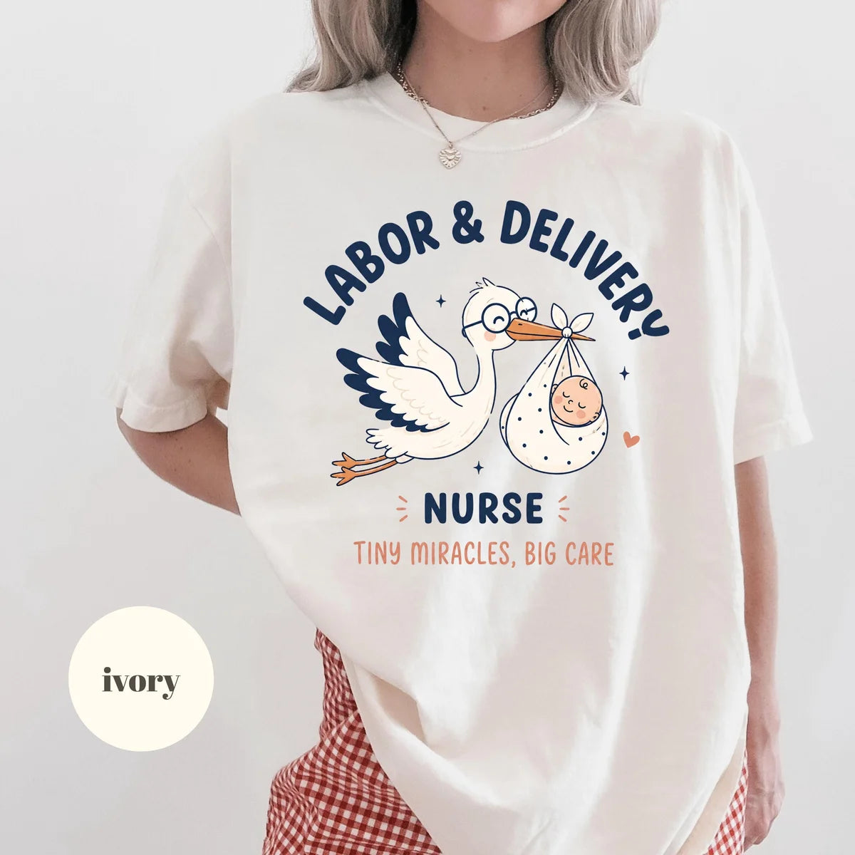 Ivory Comfort Colors 1717 T-shirt with Labor and Delivery Nurse design worn by a model