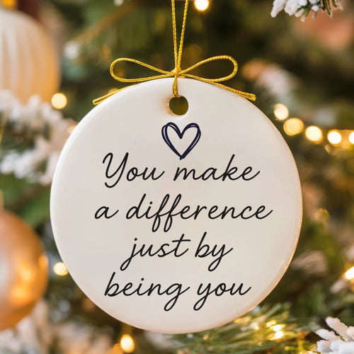 round ceramic ornament with the visible You Make Every Day a Little Brighter message.