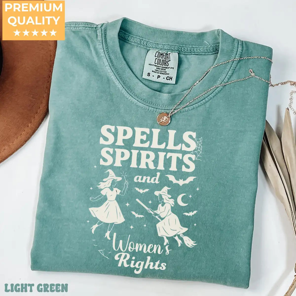 Comfort Colors T-shirt in Light Green color featuring Spells Spirits and Womens Rights graphic