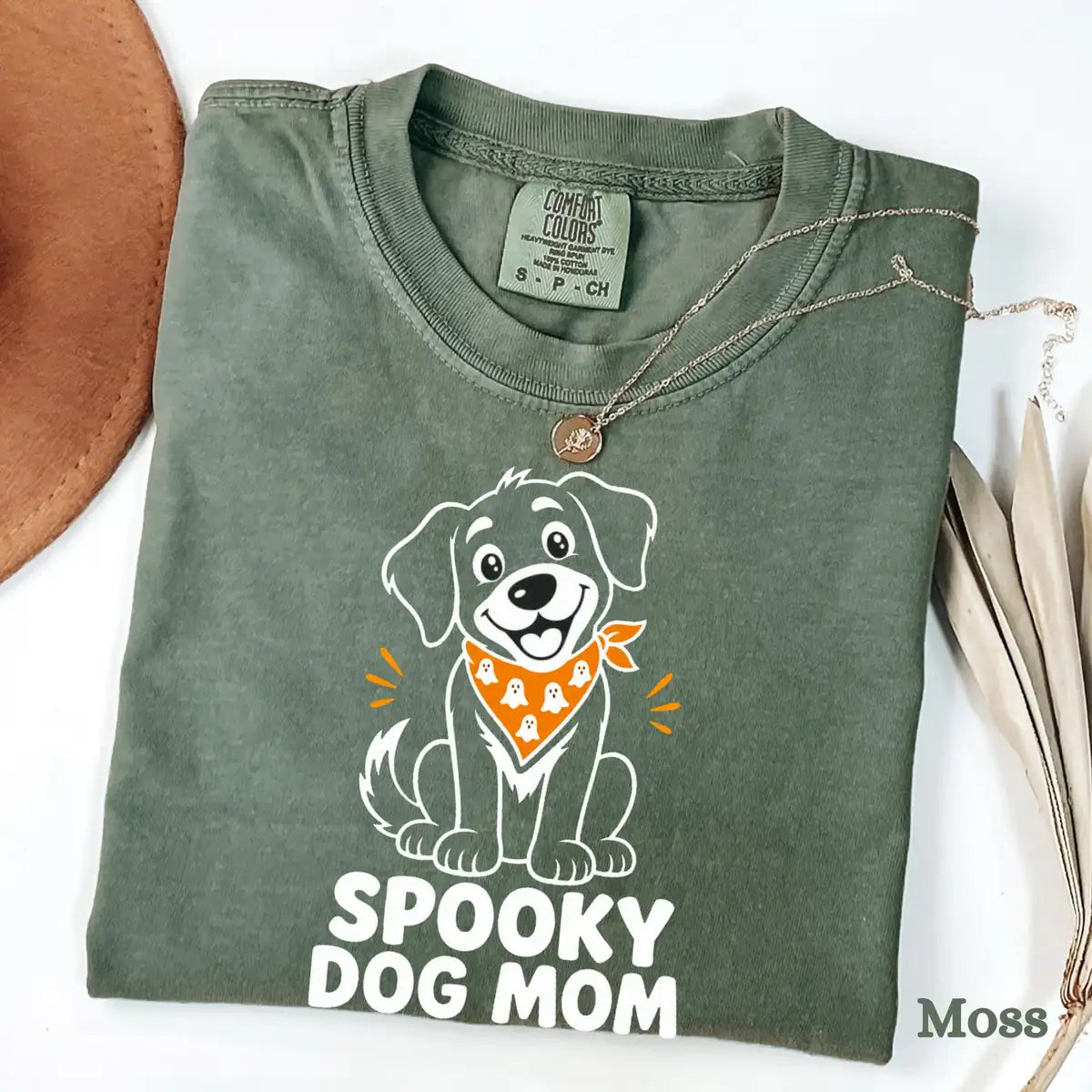 Comfort Colors T-shirt flatlay in Moss color featuring Spooky Dog Mom puppy graphic