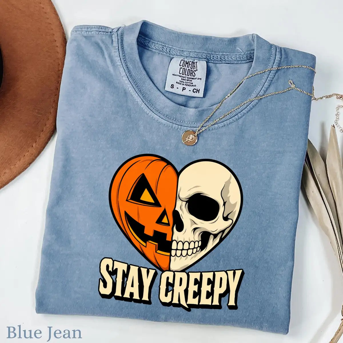 Violet Comfort Colors T-shirt with Stay Creepy Pumpkin Skeleton Heart Halloween artwork