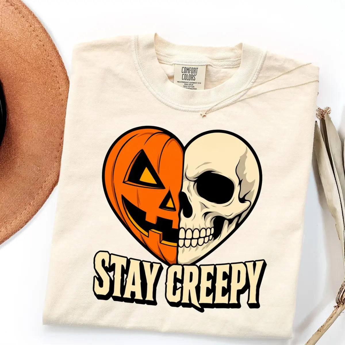 Blue Jean Comfort Colors T-shirt with Stay Creepy Pumpkin Skeleton Heart Halloween artwork