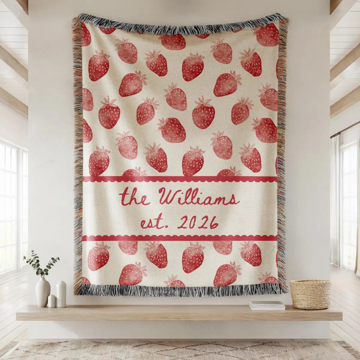 Personalized strawberry scallop woven blanket shown in a styled room setting