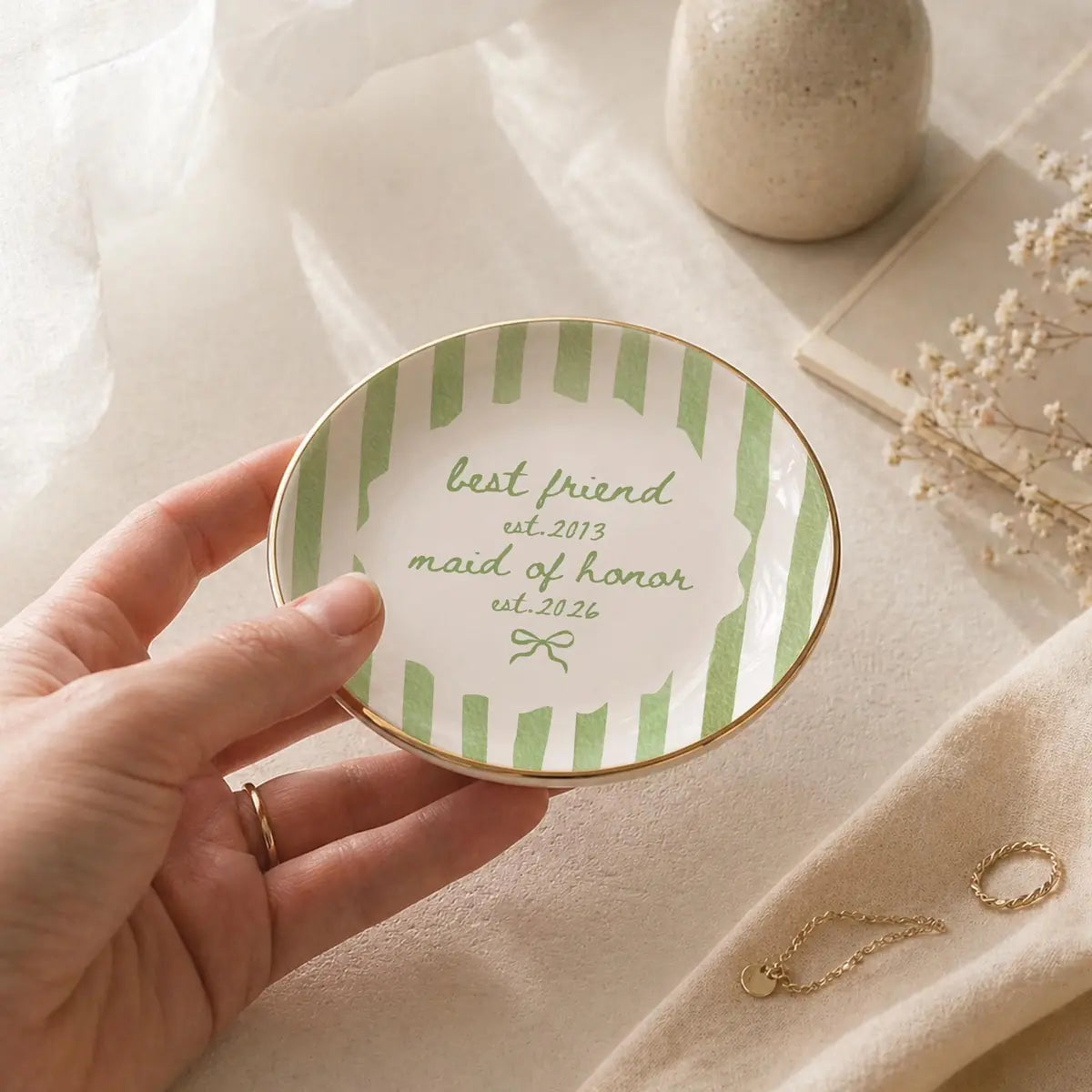 Close-up of Striped Bow Custom Time Maid Of Honor Ring Dish
