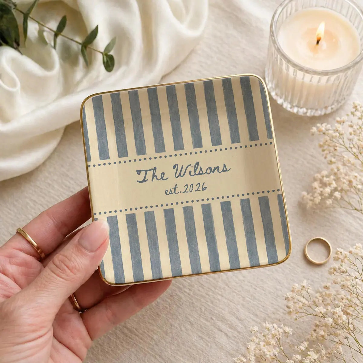 Close-up of Striped Custom Name Dates Engagement Ring Dish