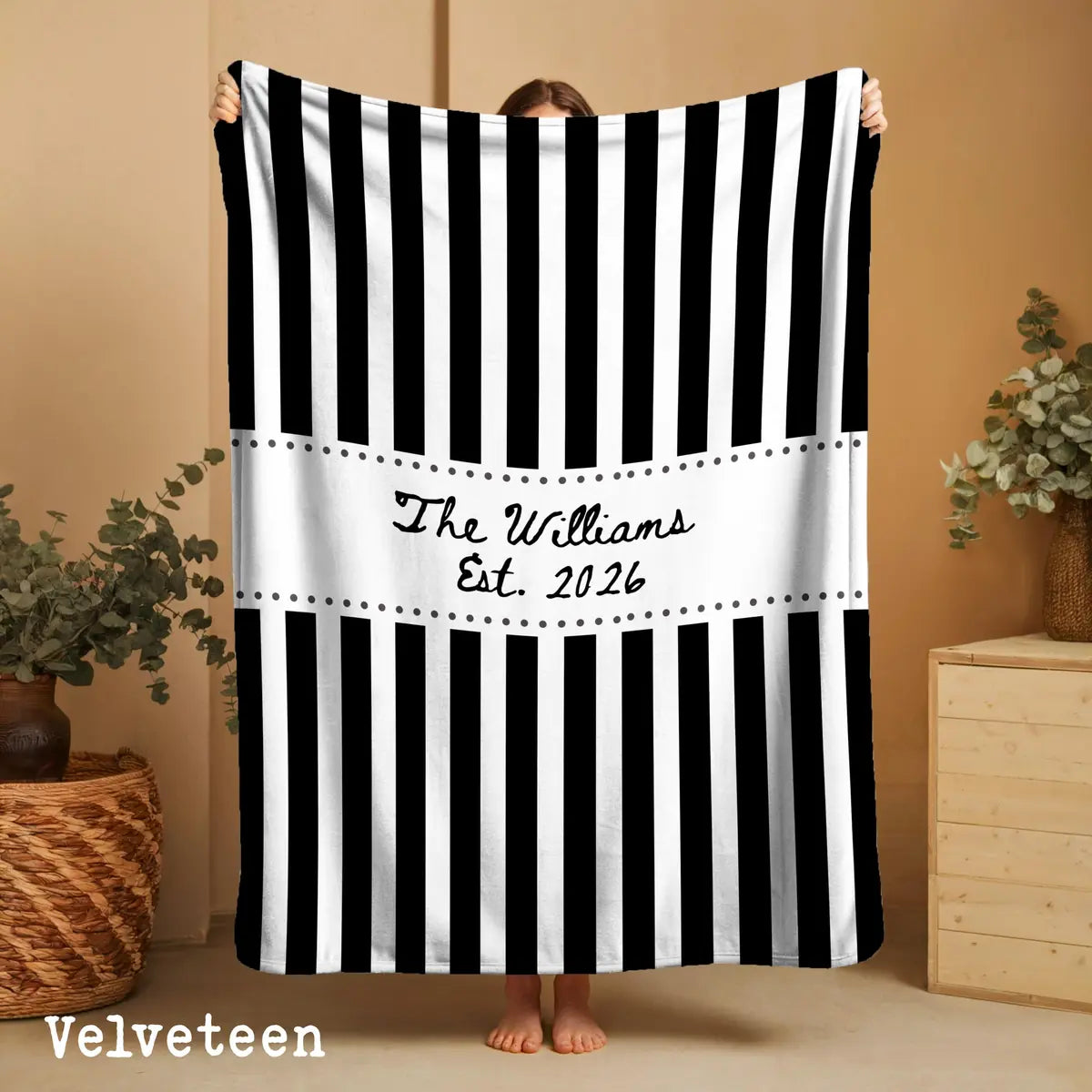 Personalized striped frame woven blanket shown in a styled room setting