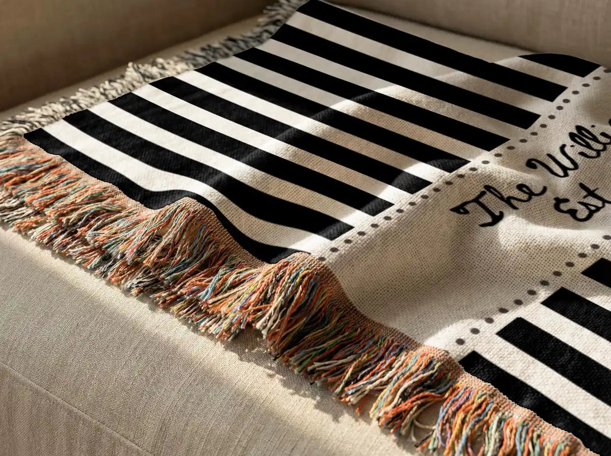 Personalized striped frame woven blanket shown in a styled room setting