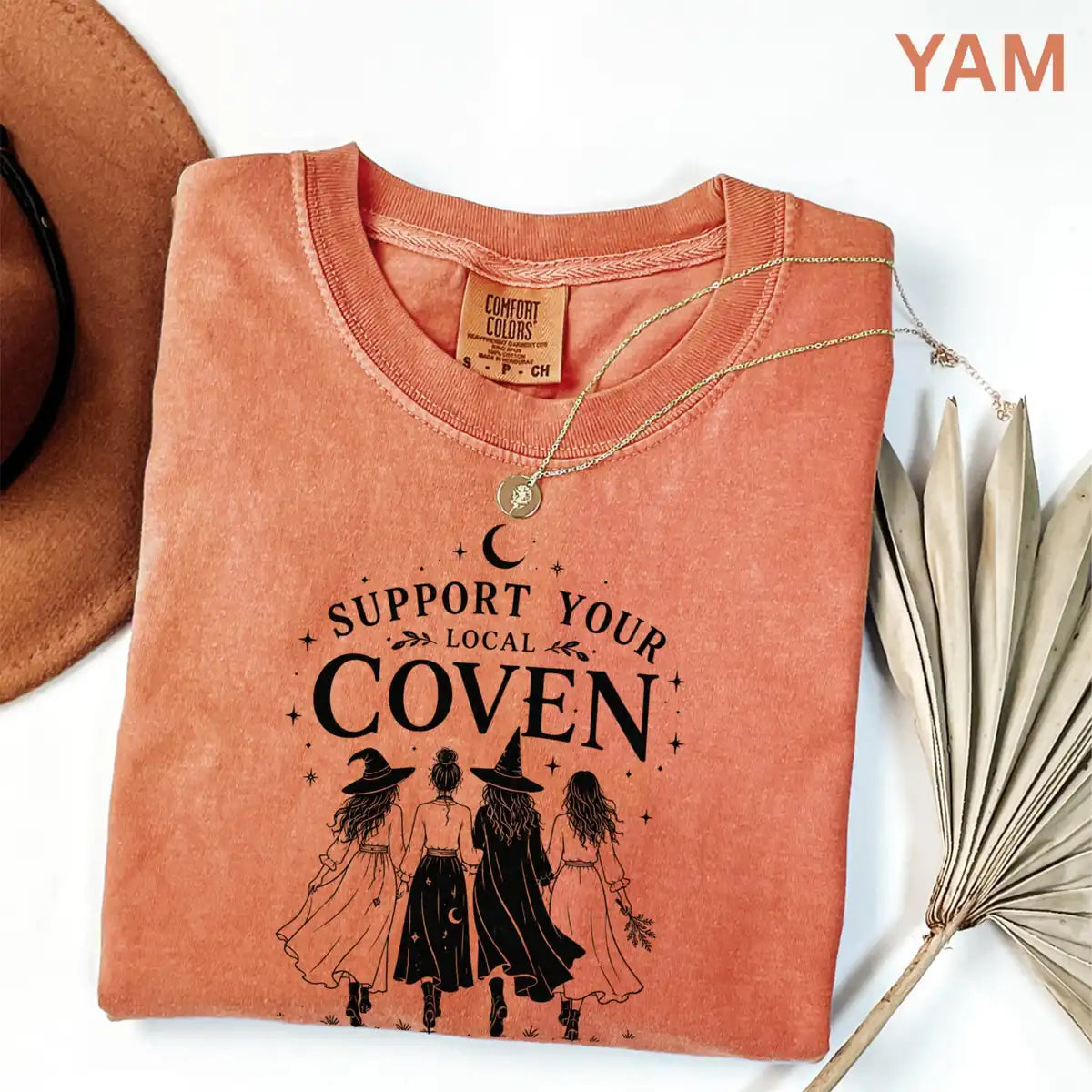 Comfort Colors T-shirt in Yam color featuring Support Your Local Coven walking witches graphic