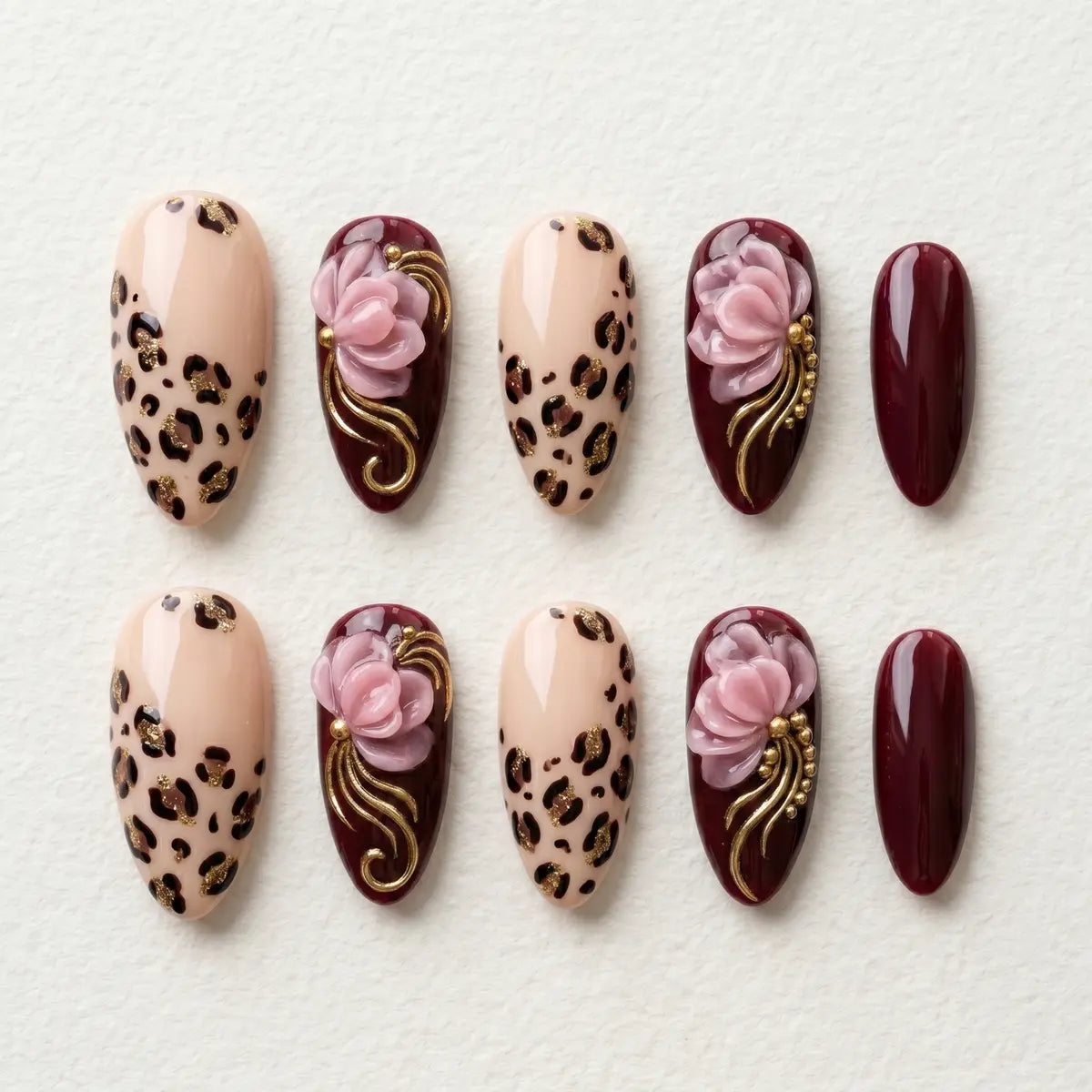 tan burgundy 3d almond long press on nails leopard pink floral flat lay 01