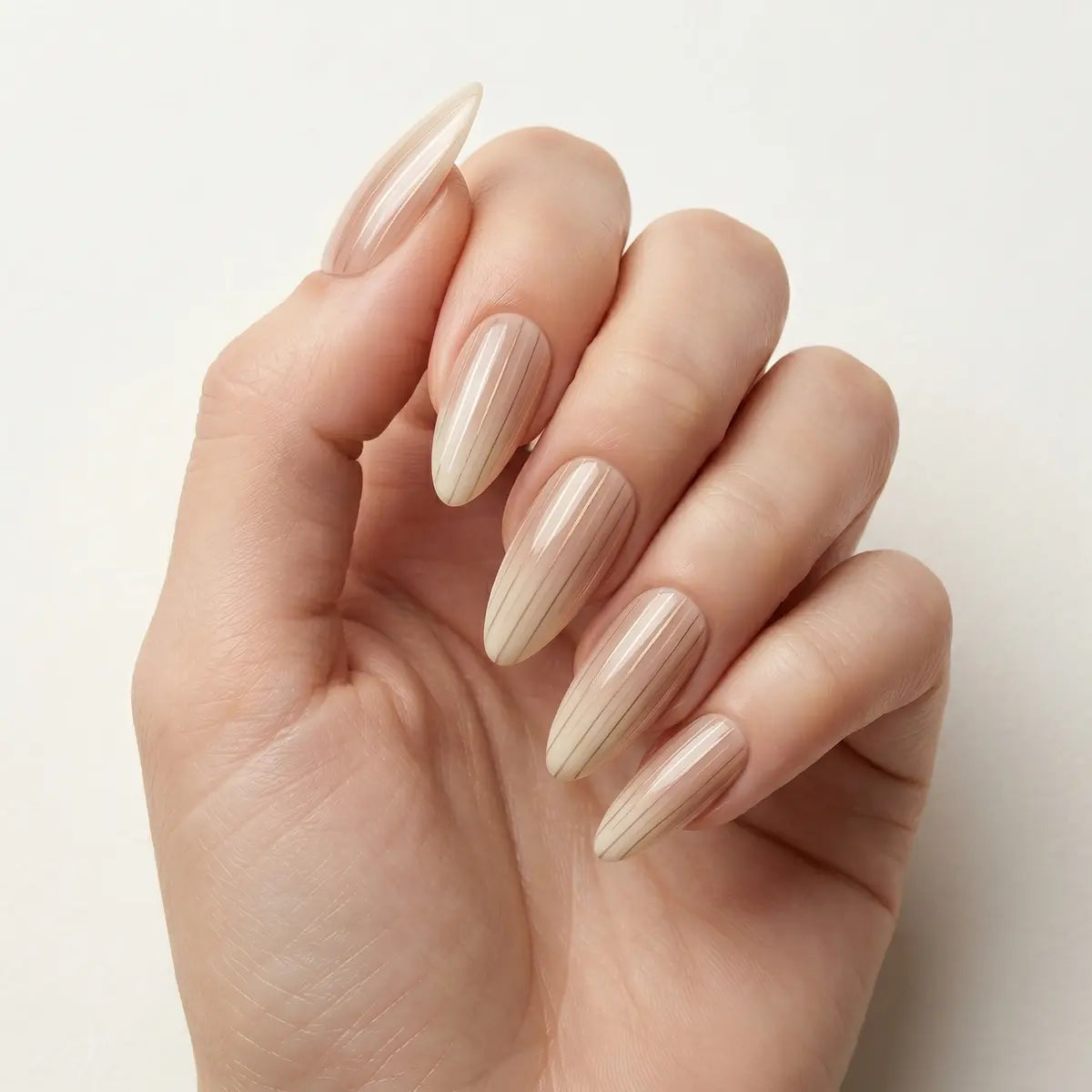 tan nude almond long press on nails vertical stripe flat lay 01