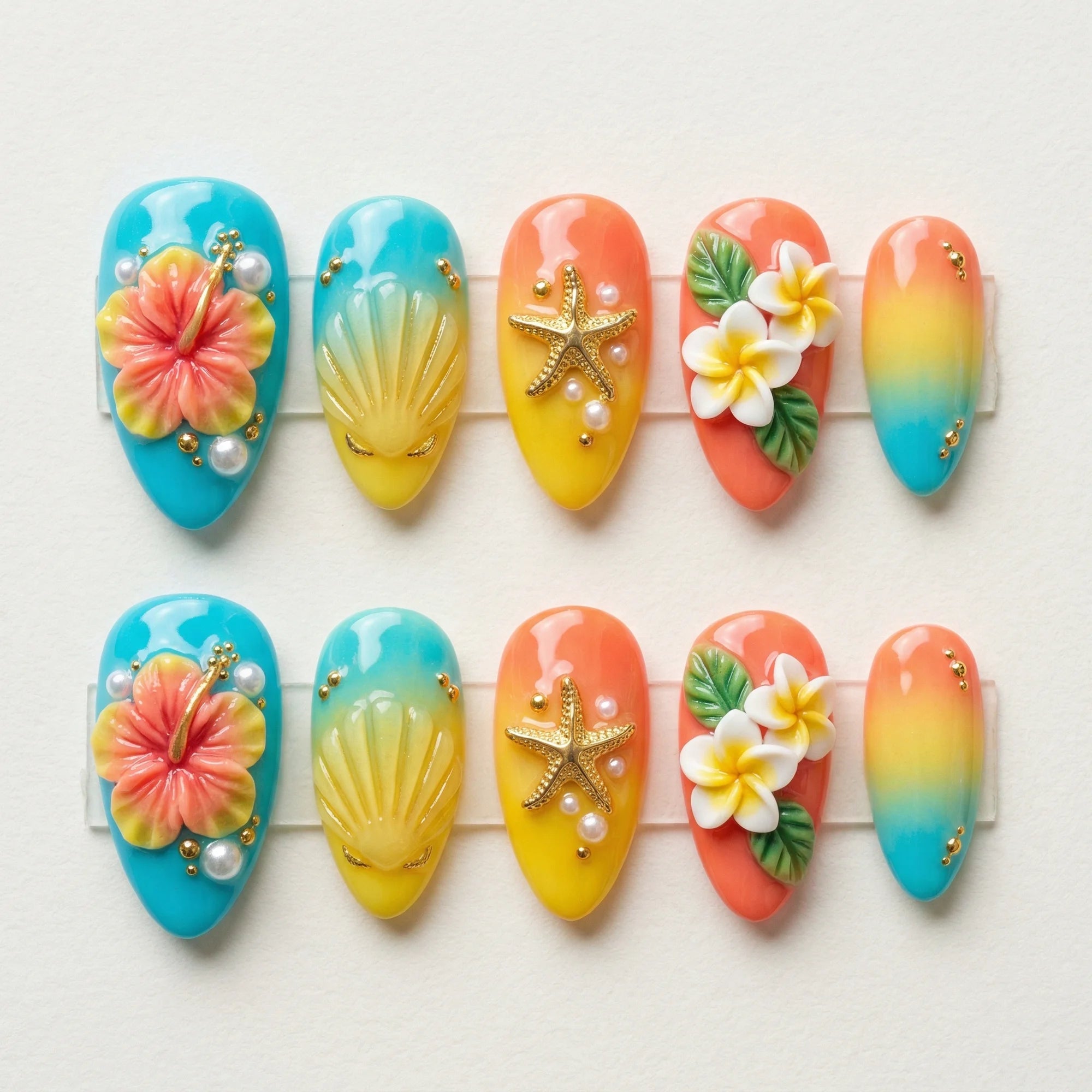 teal 3d almond medium press on nails hibiscus orange seashell flat lay 01