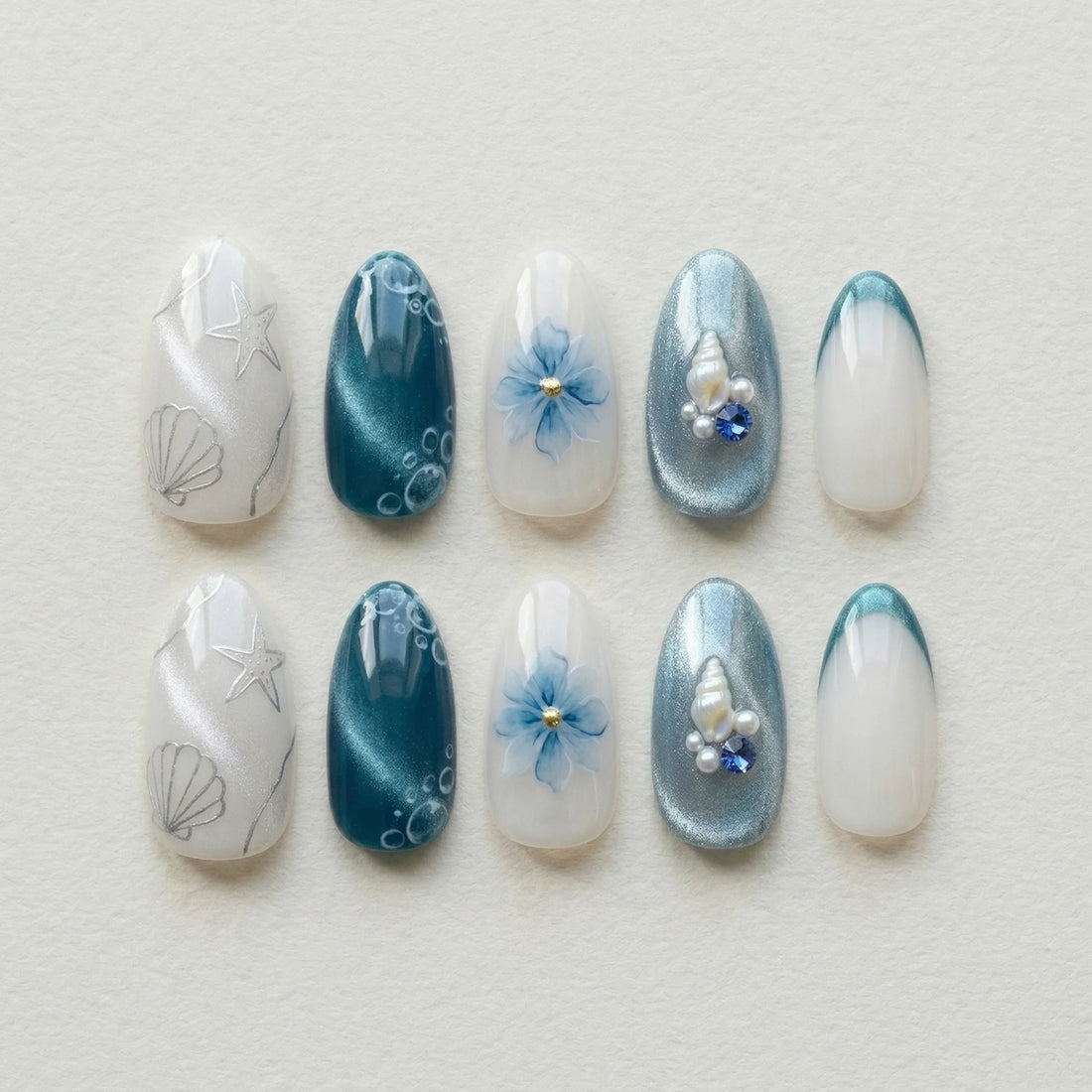 teal cat eye 3d almond medium press on nails ocean seashell charm lifestyle 02