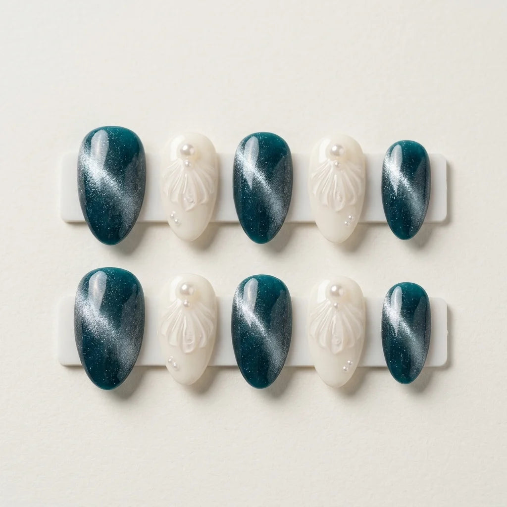 teal ivory 3d cat eye almond press on nails seashell pearl flat lay 03
